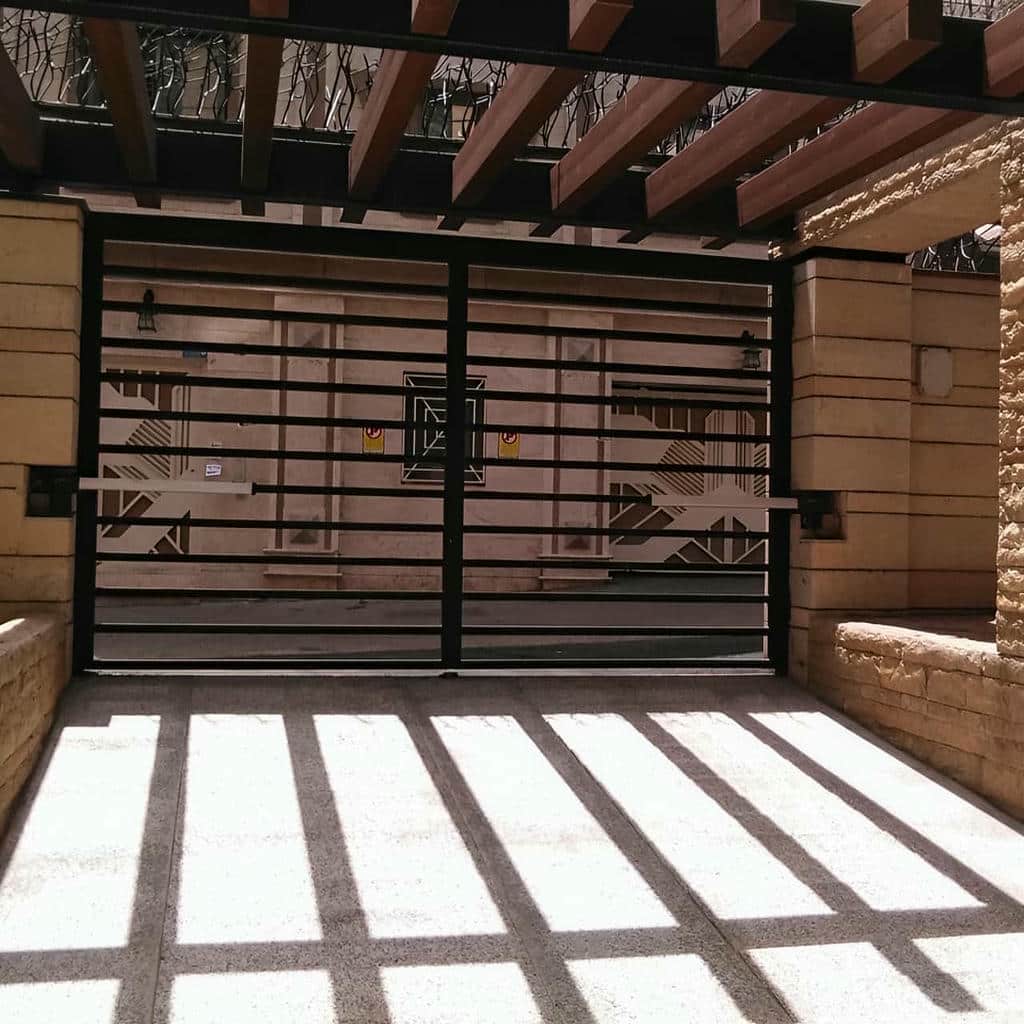 فروش جک درب حیاط دو لنگه سنگین با مدار فرمان