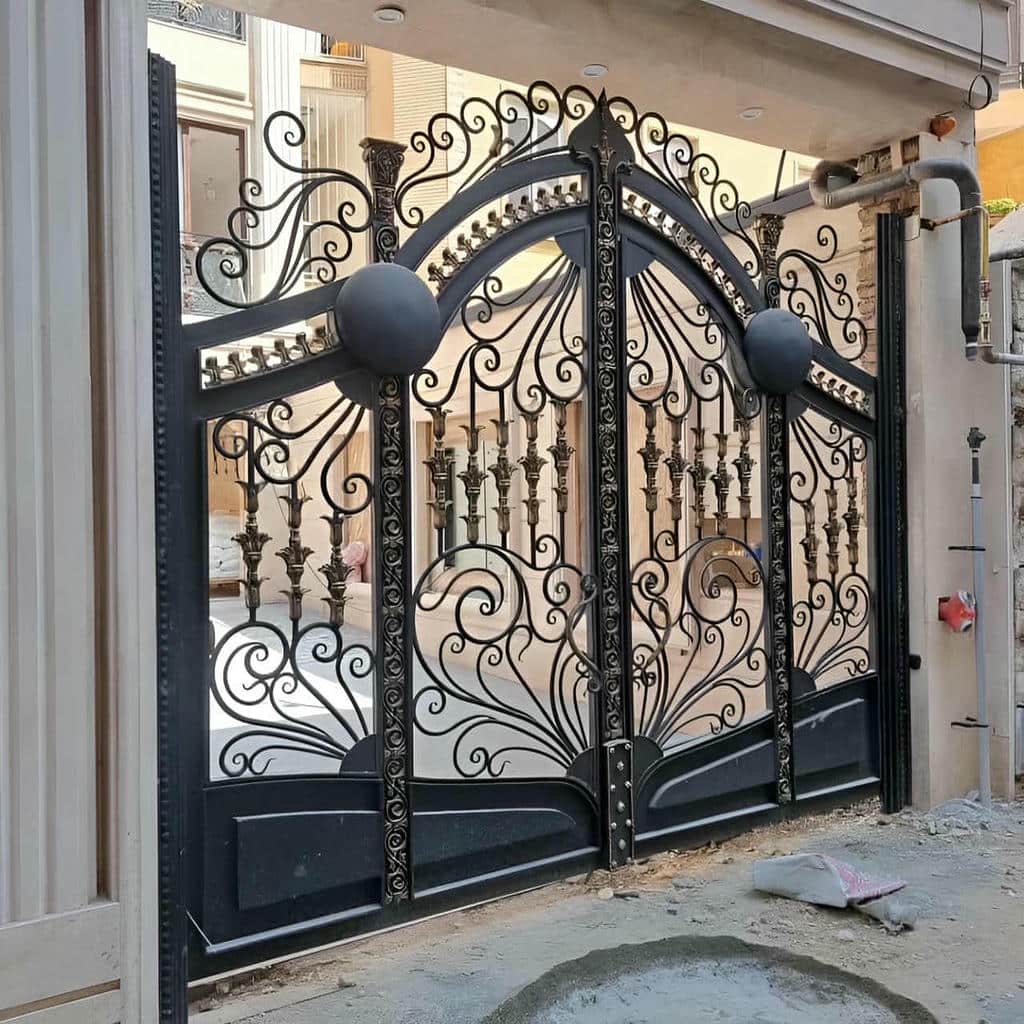 خرید درب پارکینگ حیاط لولایی متناسب با مسیر خودرو