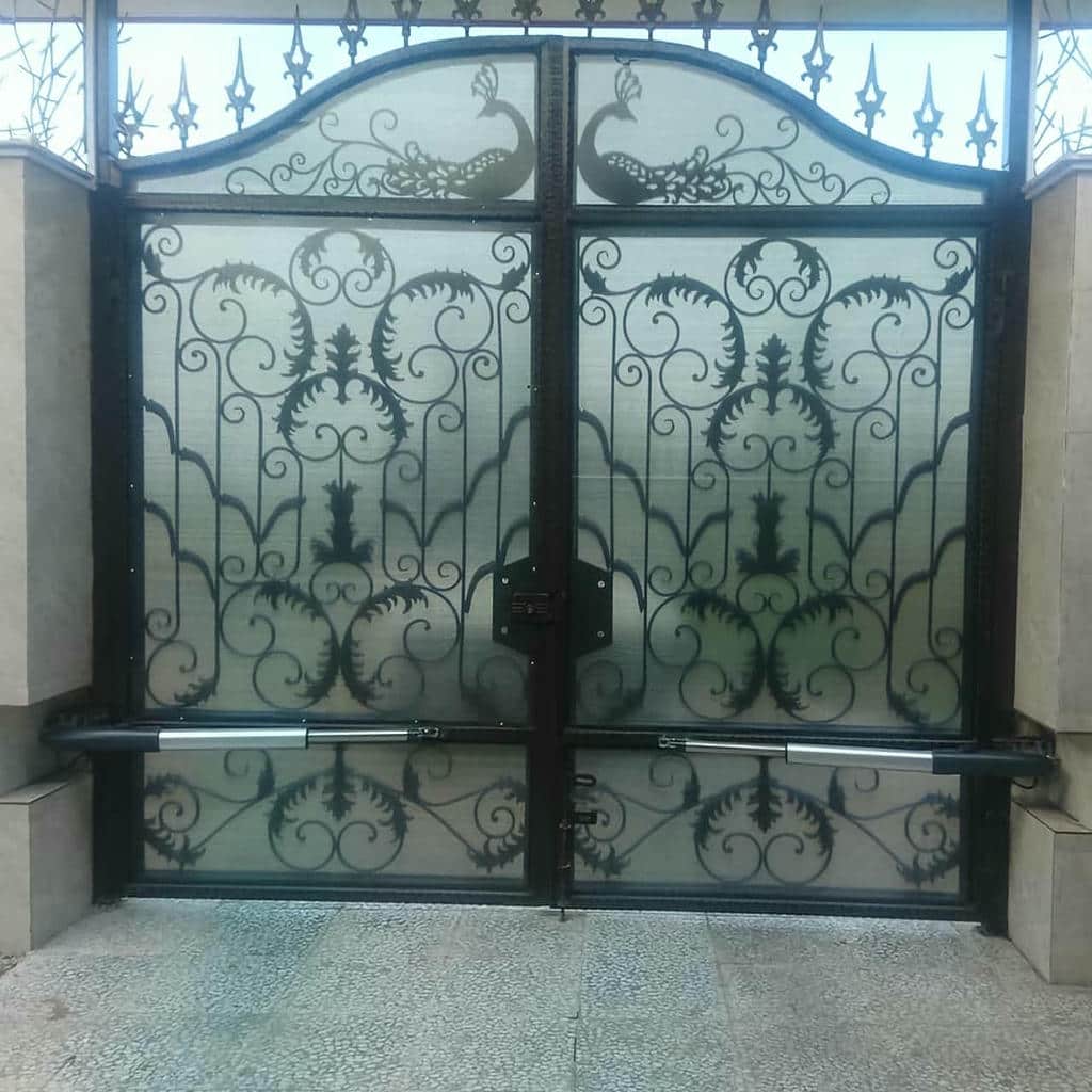 جک درب پارکینگ بازویی در سمنان کنار درب فلزی