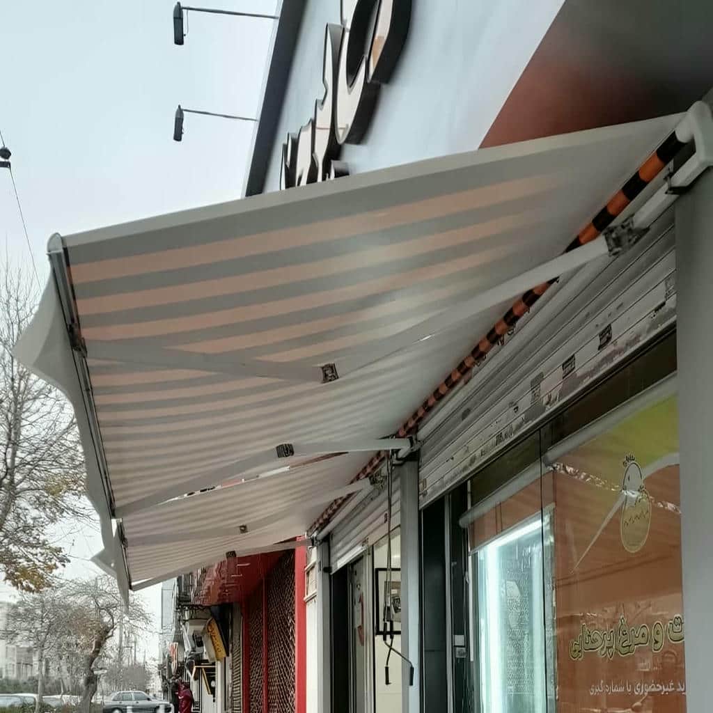 سایبان برقی بازویی با پارچه کرم در استان مازندران