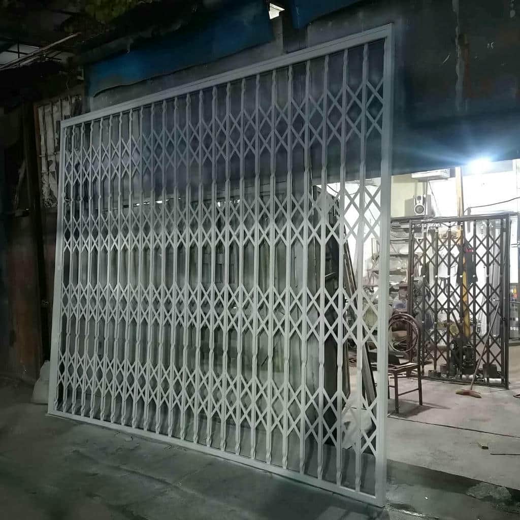 حفاظ درب آکاردئونی فلزی در استان کهگیلویه و بویراحمد مرکز فروش و سفارش حفاظ درب آکاردئونی در استان کهگیلویه و بویراحمد